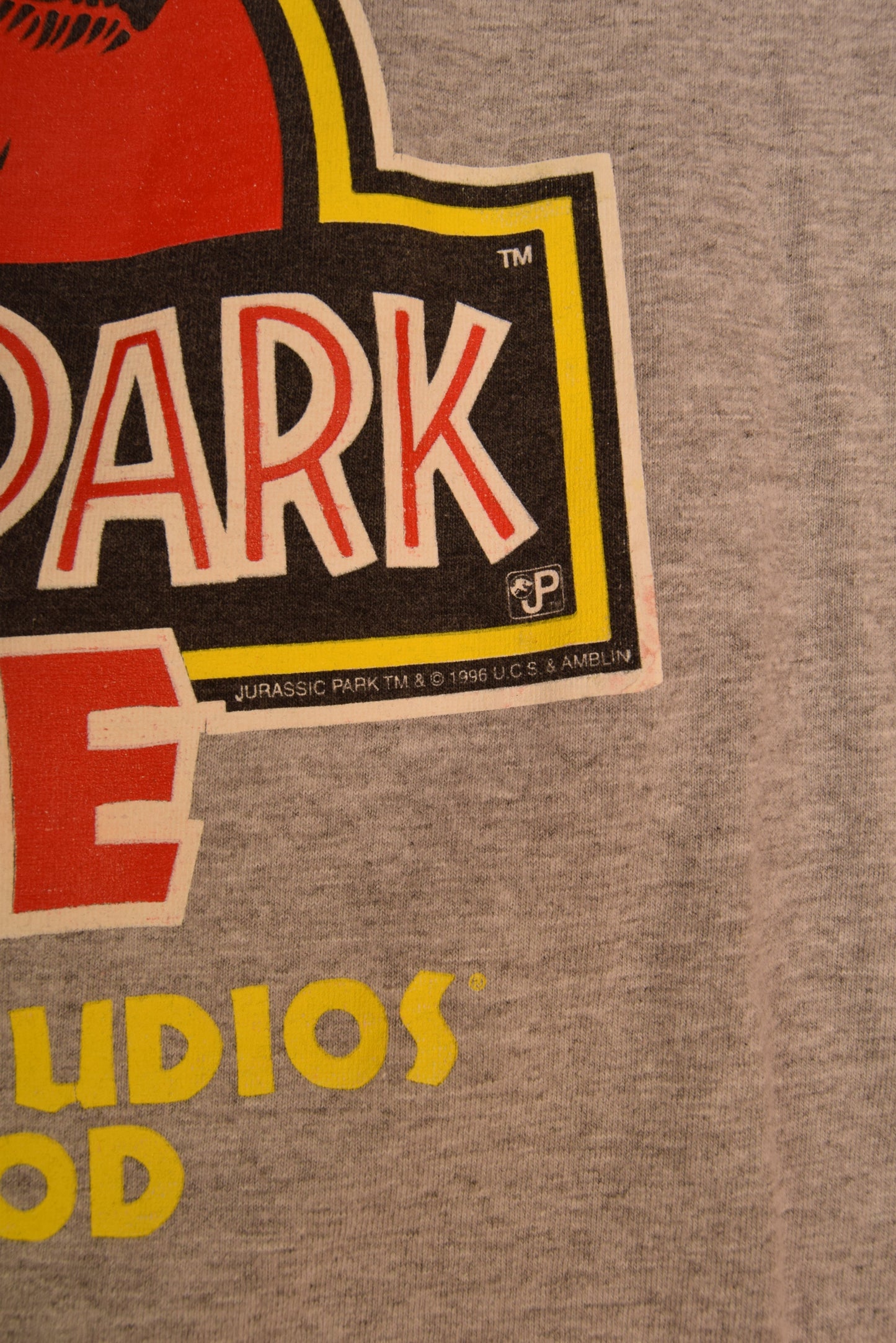 Vintage Jurassic Park The Ride 1996 T-Shirt Universal Studios Hollywood I Survived Steven Spielberg Made in USA Single Stitch Cotton Grey Size Large