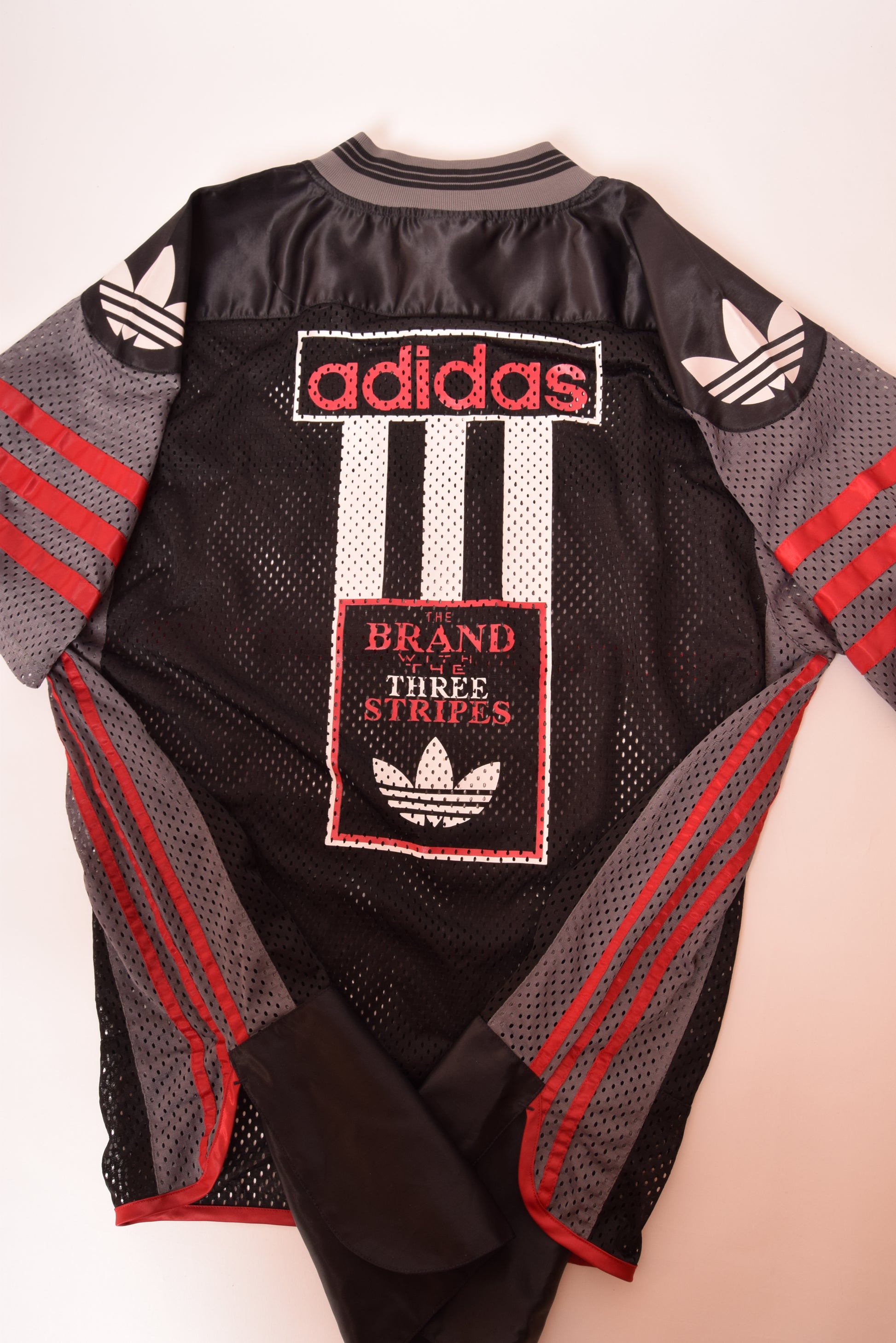 Vintage 90's Adidas 'The Brand With Three Stripes' Jersey Size M Black Grey Red